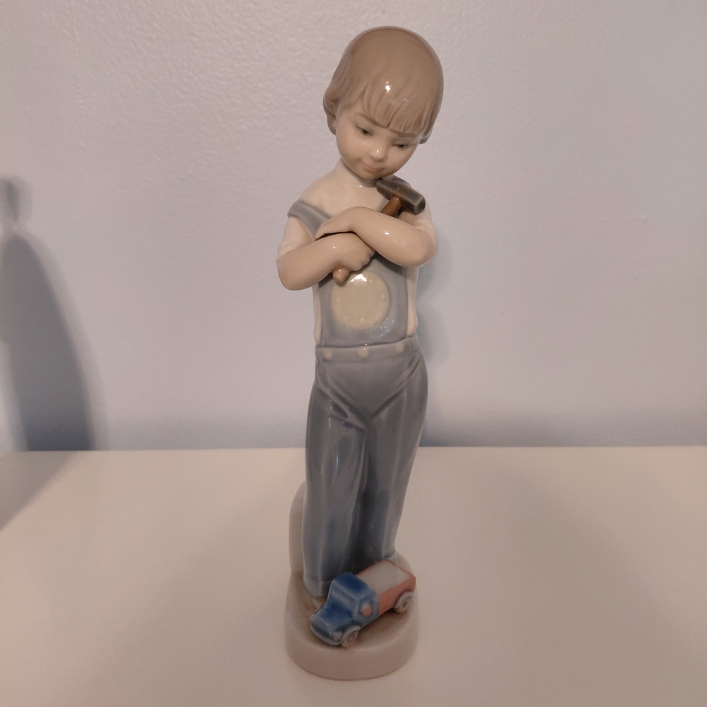 Lladro Boy Figurine with Toy Car